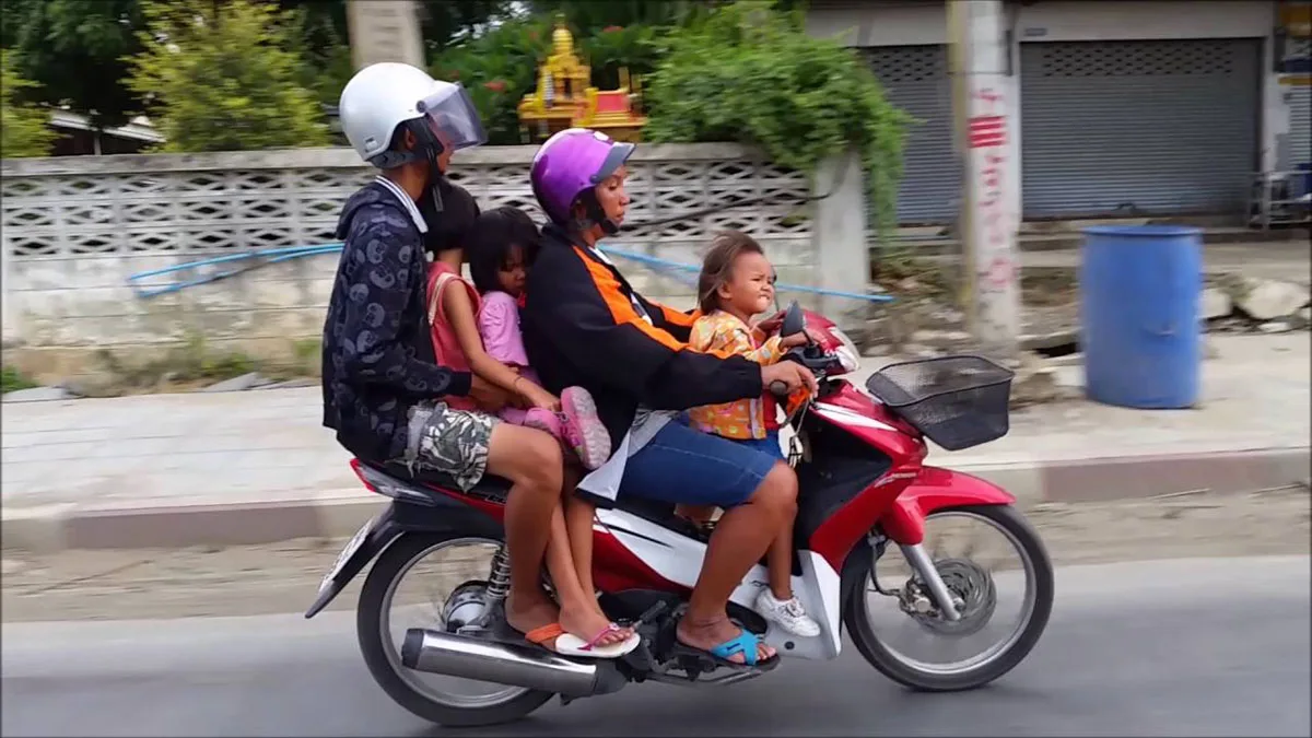 Thai family ride scooter